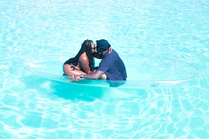 Couples Clear Kayak PhotoShoot Grand Turk Island - Getting positioned in the clear kayak