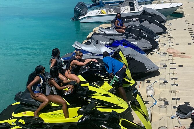 Jet Skiing around La famille ship and smaller pristine cays - Family appeal, photos, and the human side of the tour