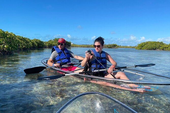 Mangrove Cay and Iguana Island Tours - Crossing the turquoise channel to Little Water Cay