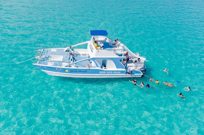 Private 4-Hour Catamaran Tour from Providenciales in Turks and Caicos - Leaving Grace Bay and Following the Coast