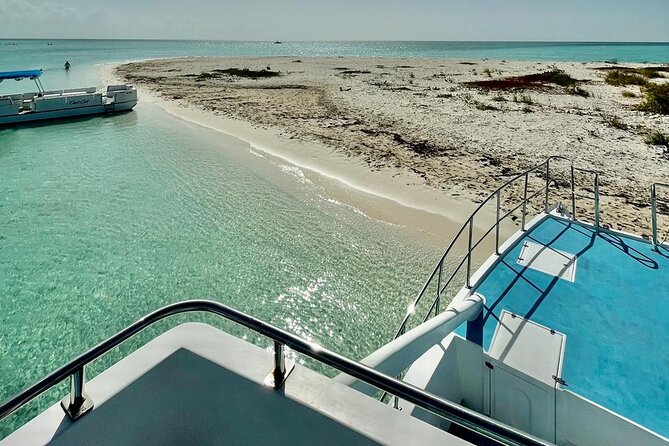 Private 7-Hour Catamaran Tour in Turks and Caicos - Food, drinks, music, and the second deck