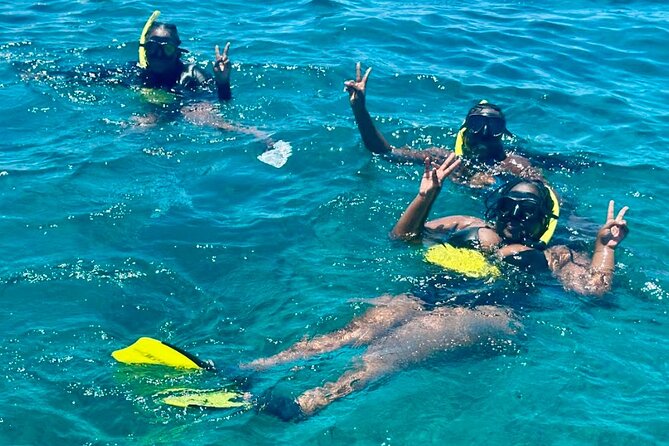 Private Boat Tour with Snorkeling and Beach BBQ - Meeting La Famille Express on the Caicos Banks