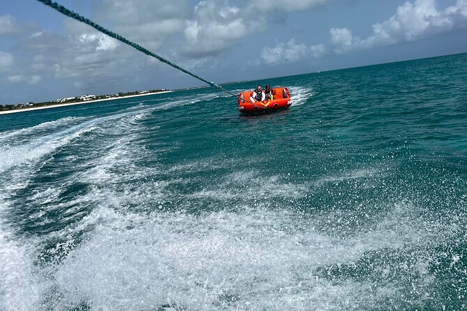 Tubing on grace bay beach Turks and caicos islands - Weather, Timing, and Cancellation Rules