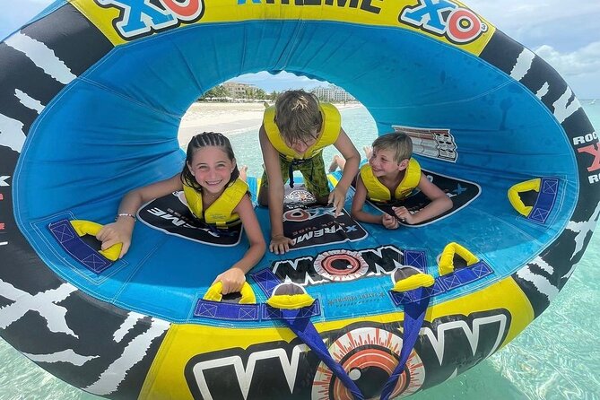 Wow Extreme Tube on Gracebay Beach Turks and Caicos Islands - Getting ready for the face-down ride